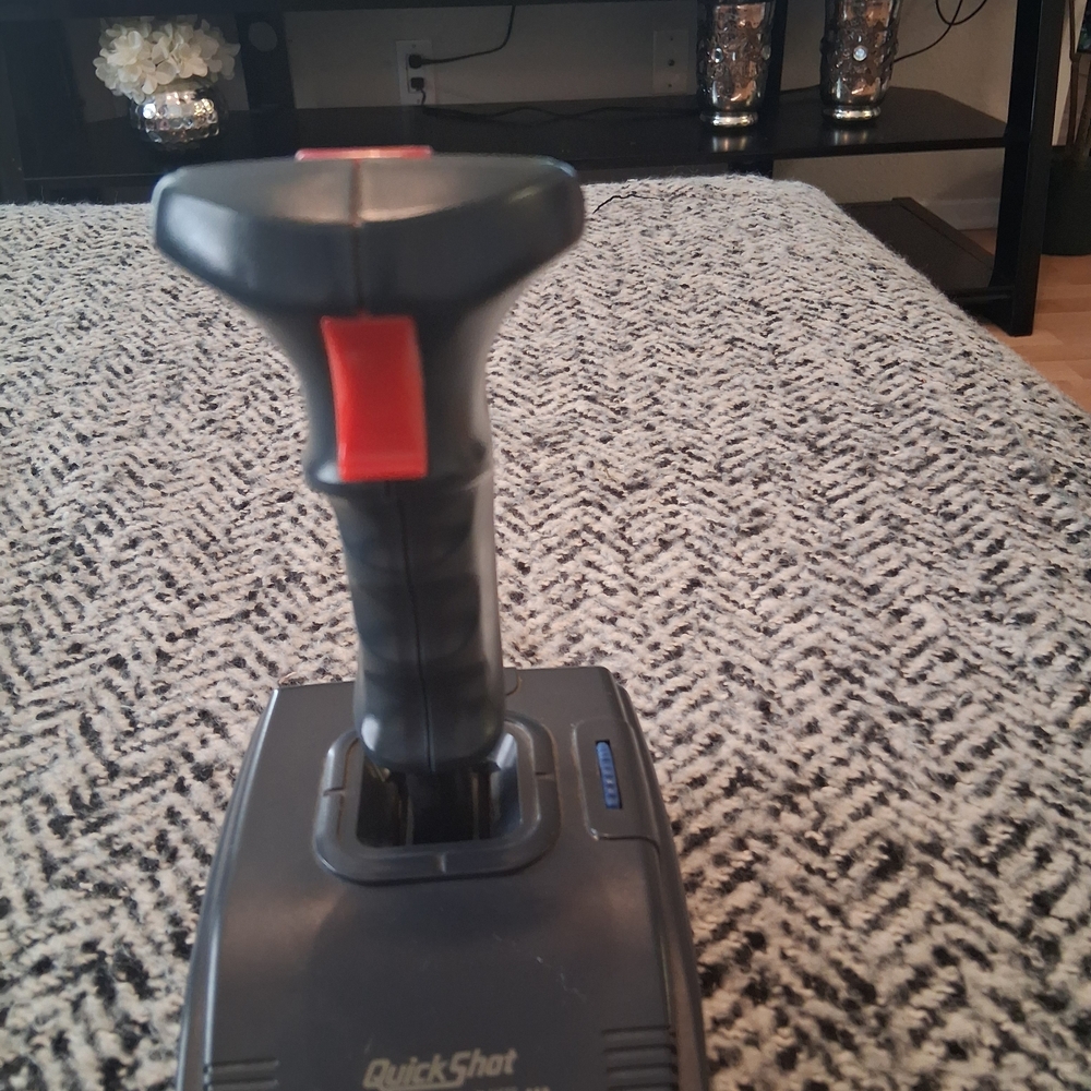 Black and Red Joystick Controller